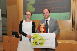 Preisverleihung durch Stadträtin Mag.a Eva Schobesberger an Mag. Robert Reithofer.