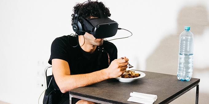 Artist Mark Farid wearing a virtual reality headset